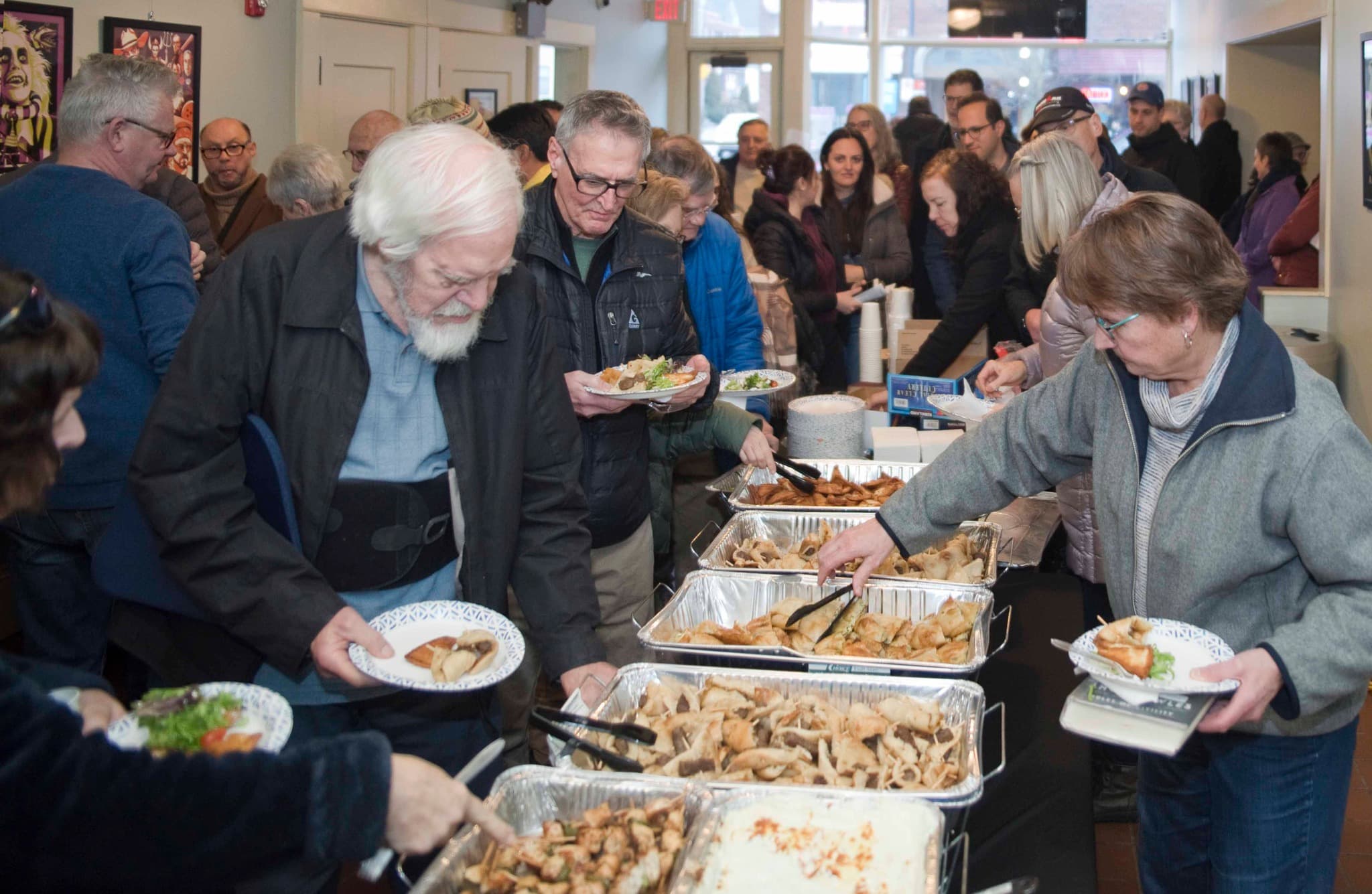 Attendees inline at buffet